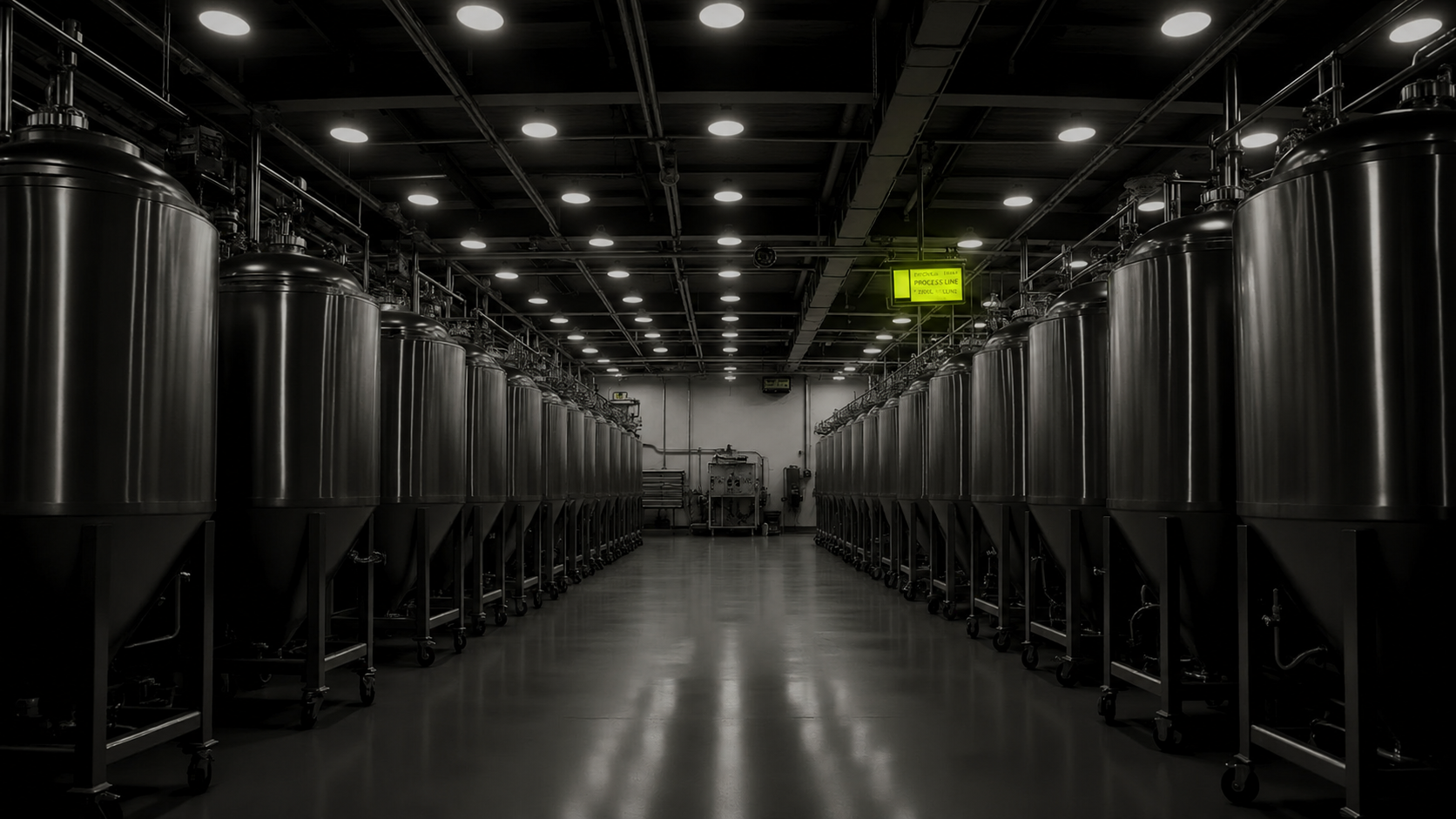 Biotech render — rows of stainless-steel bioreactor tanks lining a production hall